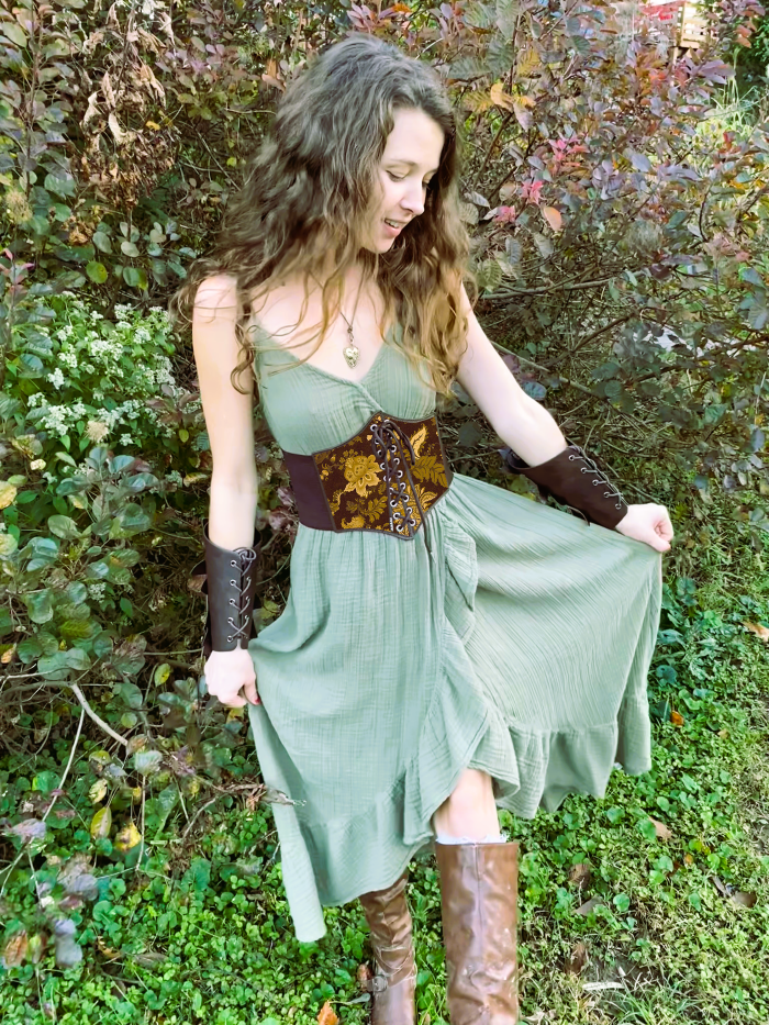 Model wearing a corset dress in the garden